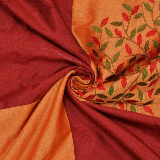 Orange Base Silk Bedsheet Featuring Maroon Patchwork and Fine Machine Embroidery